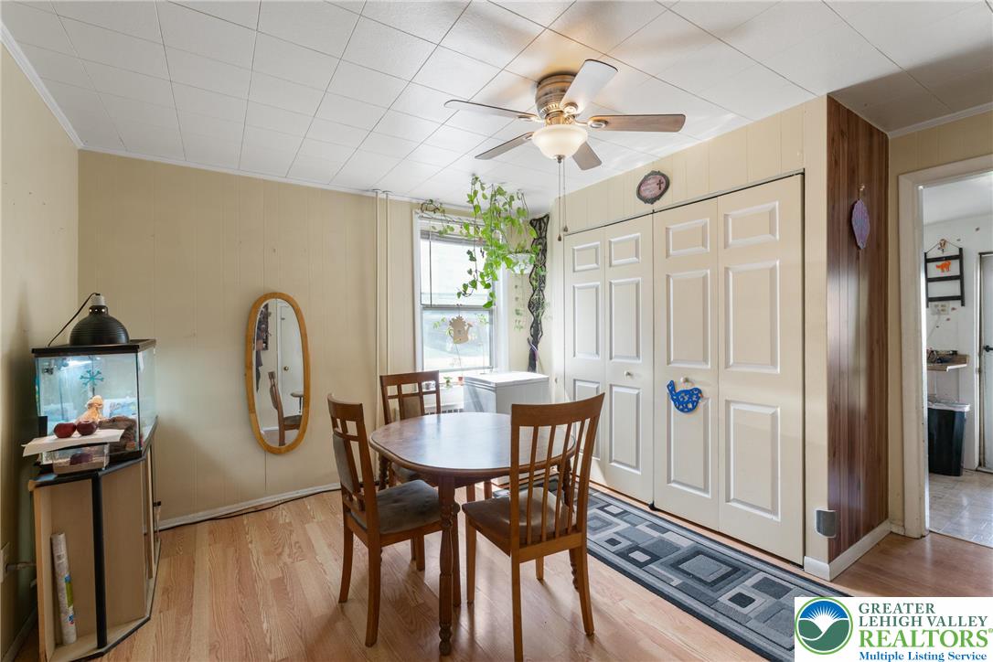 27 West Allen Street Allentown, PA 18102 - Photo 3 of 21 a view of a dining room with furniture window and wooden floor