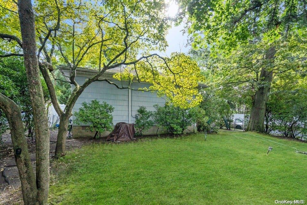 1931 Miller Place Merrick, NY 11566 - Photo 14 of 14 a view of a backyard with a garden
