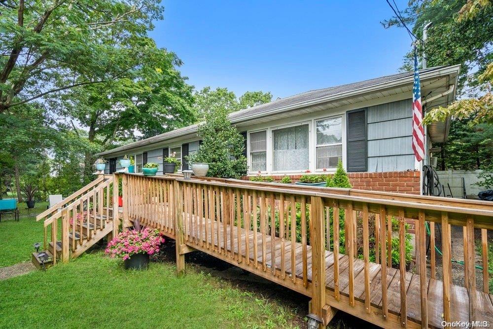 1931 Miller Place Merrick, NY 11566 - Photo 2 of 14 a view of a deck with a white roof deck
