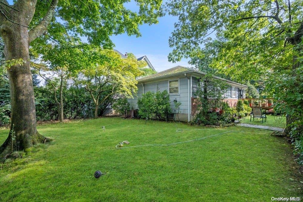 1931 Miller Place Merrick, NY 11566 - Photo 3 of 14 a view of a house with a yard