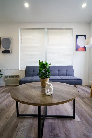 a bedroom with a bed and a bathroom