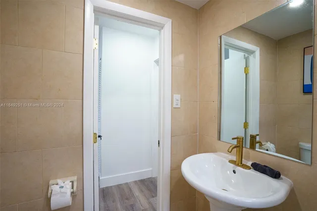 a living room with furniture and a gate