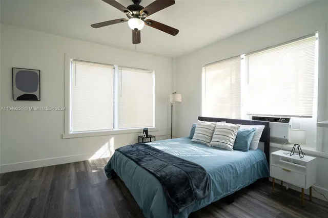 a kitchen with a sink a counter top space and a window