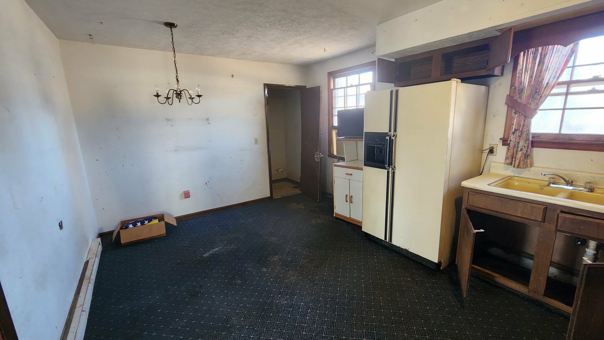 312 Bluebird Lane Dickson, TN 37055 - Photo 5 of 12 a kitchen with refrigerator and window