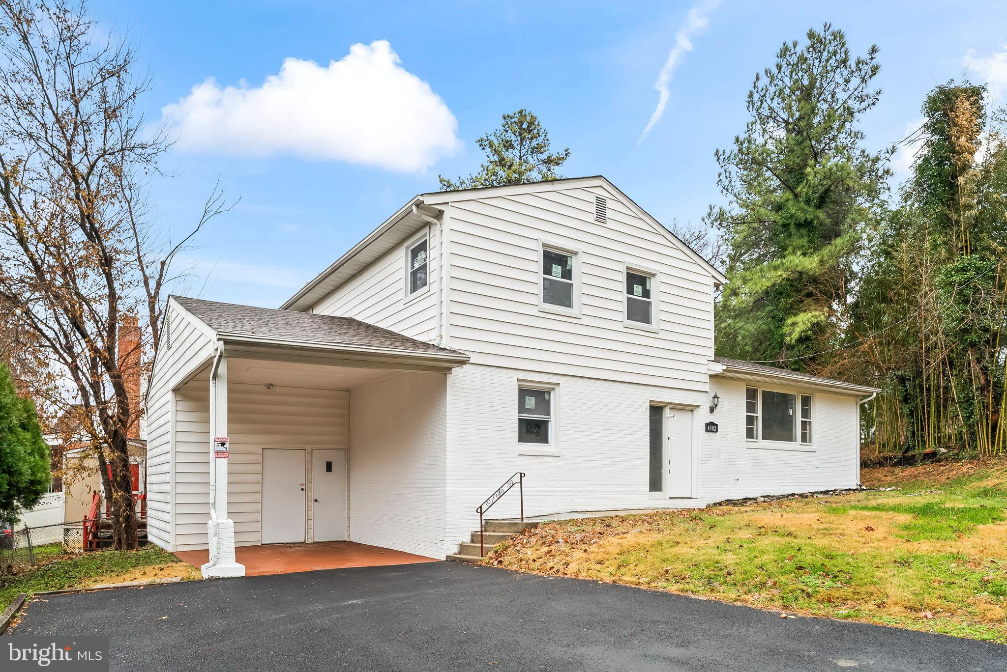 a front view of a house with a garage