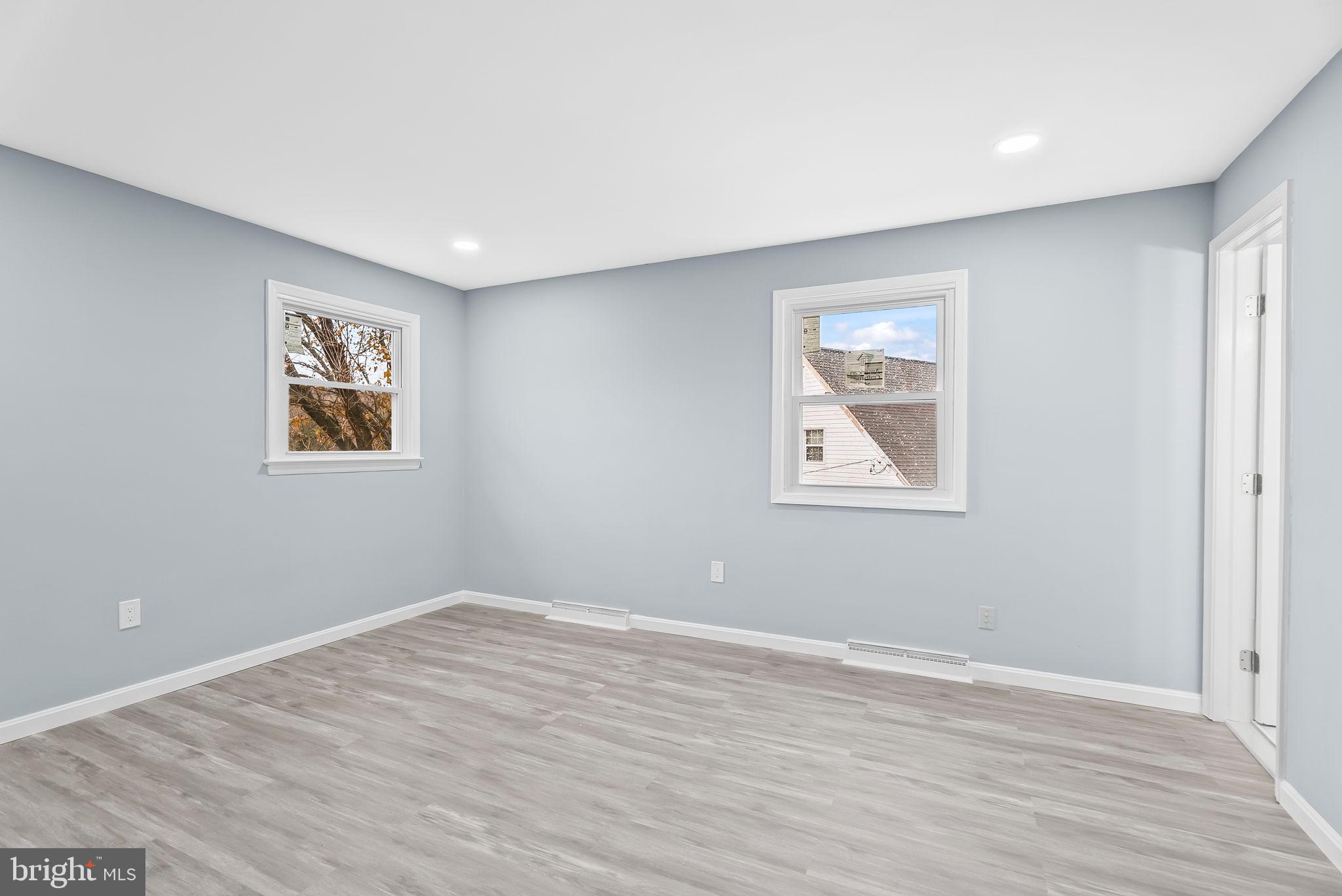 4302 Henderson Road Temple Hills, MD 20748 - Photo 17 of 33 a view of room with window and wooden floor