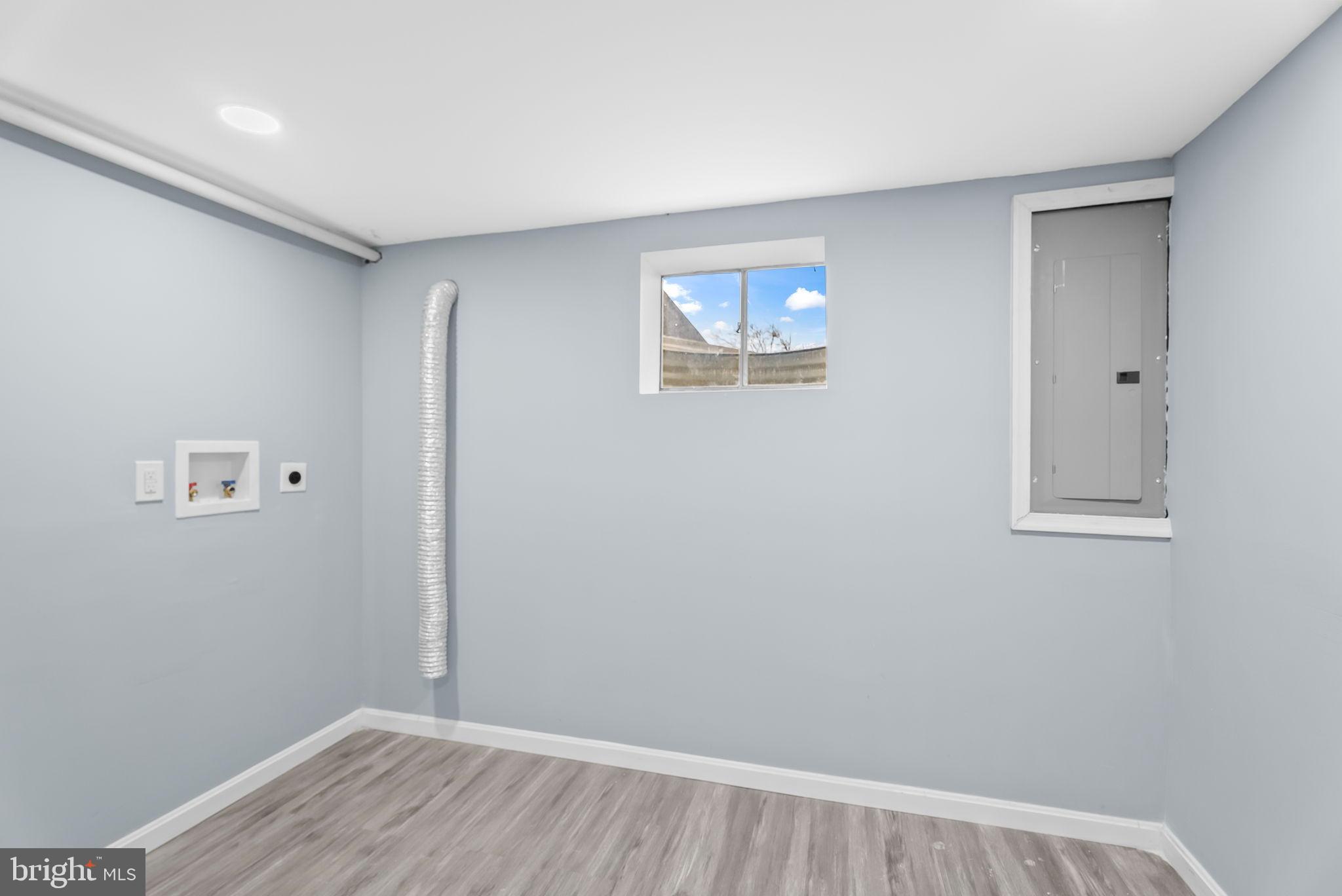 4302 Henderson Road Temple Hills, MD 20748 - Photo 27 of 33 a view of an empty room with wooden floor