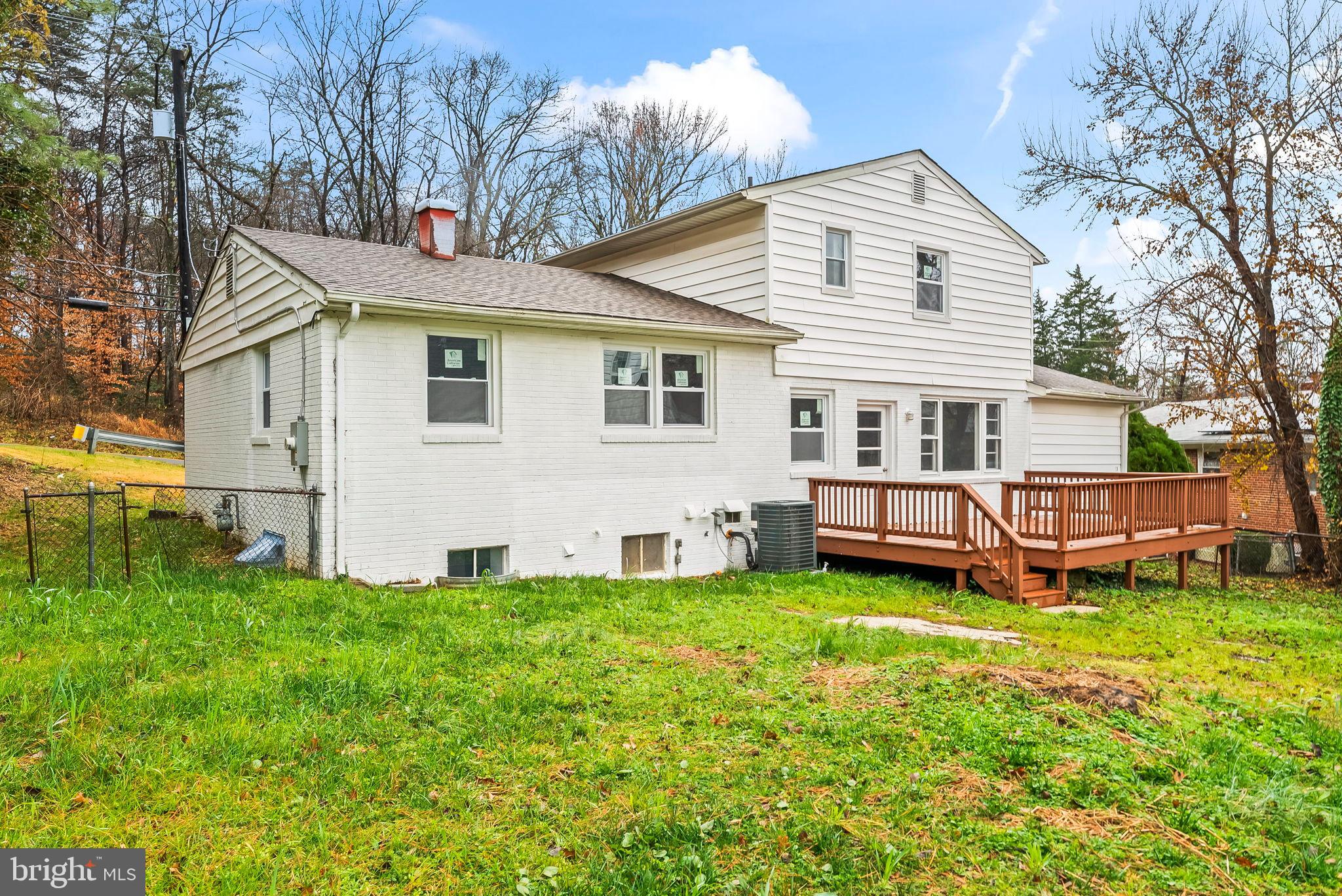 4302 Henderson Road Temple Hills, MD 20748 - Photo 31 of 33 a view of a house with a yard and sitting area