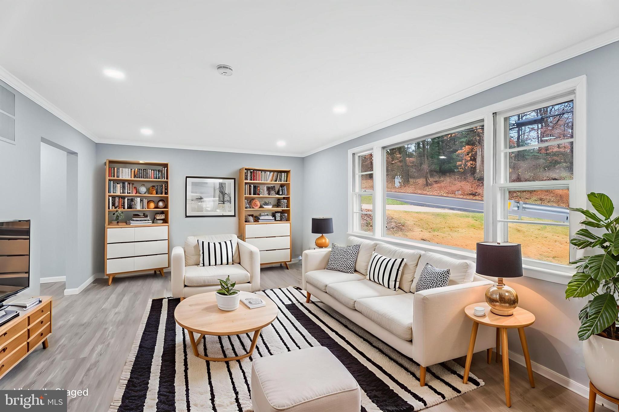 4302 Henderson Road Temple Hills, MD 20748 - Photo 4 of 33 a bedroom with furniture and a large window