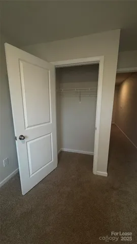 an empty room with a empty space and window