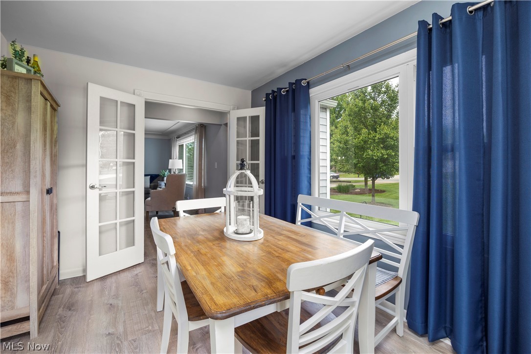 11492 Ridge Road North Royalton, OH 44133 - Photo 7 of 32 Dining area featuring wood-finish flooring and a large window