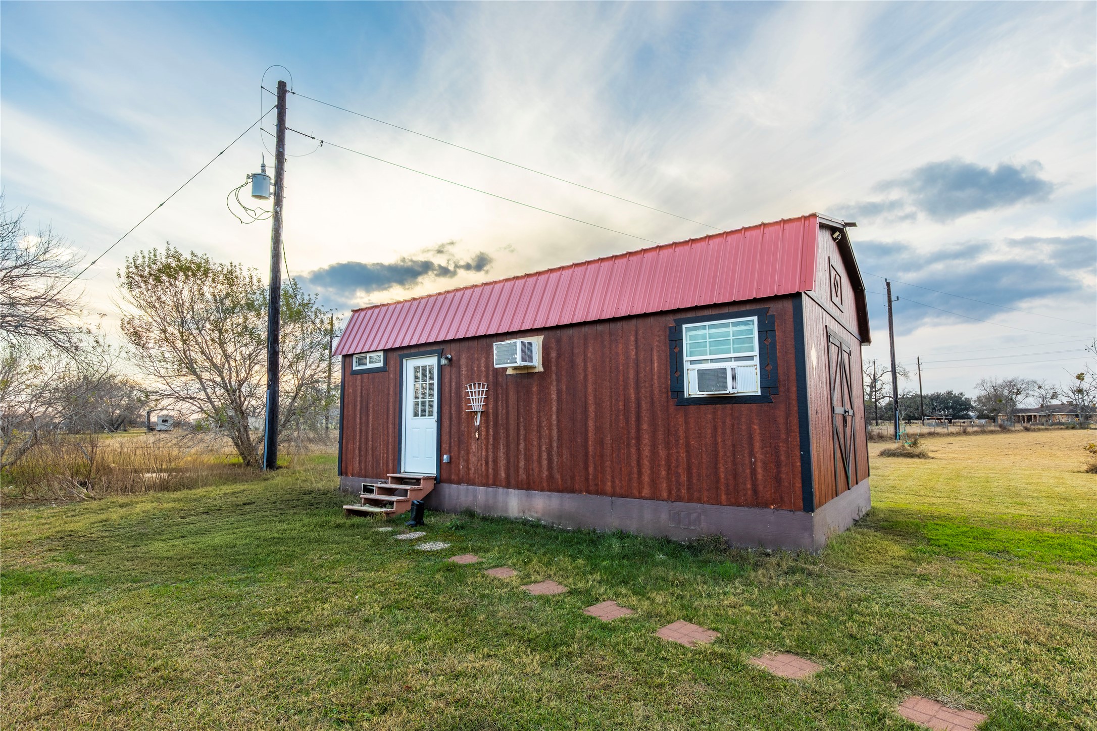 2726 Remmert Road Bellville, TX 77418 - Photo 15 of 18 a view of a house with a backyard