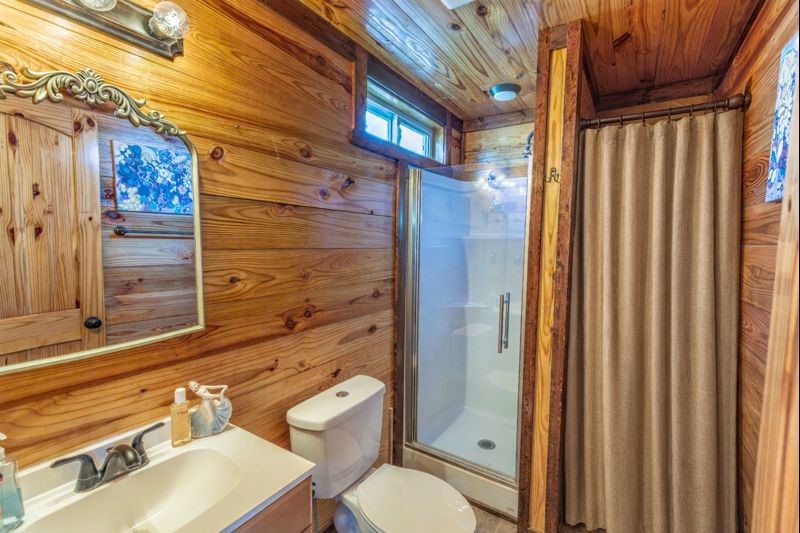 2726 Remmert Road Bellville, TX 77418 - Photo 5 of 18 a bathroom with a sink toilet and shower