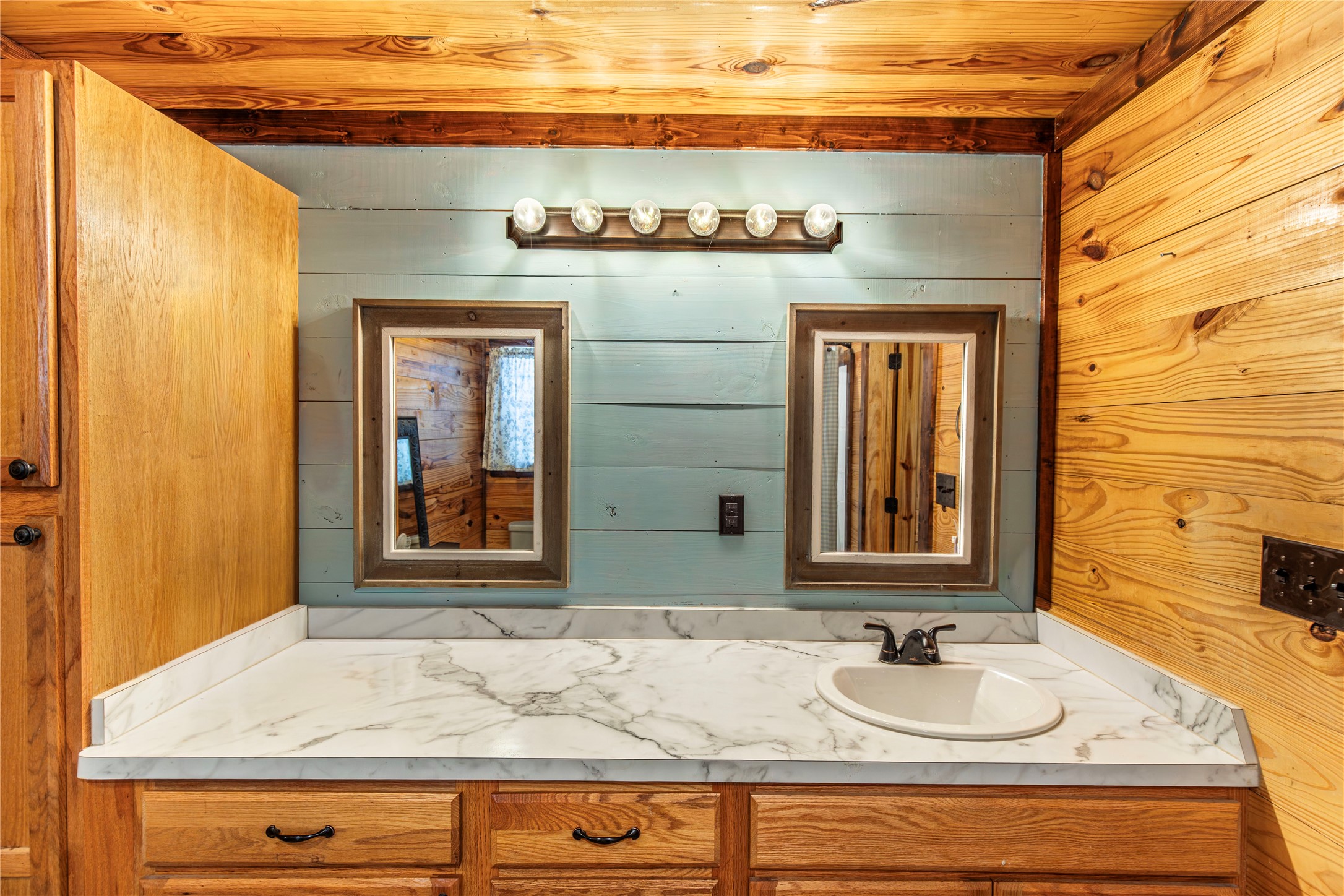 2726 Remmert Road Bellville, TX 77418 - Photo 8 of 18 a bathroom with a sink and a mirror