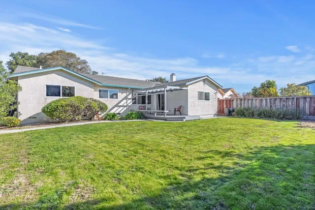 a view of a house with a big yard