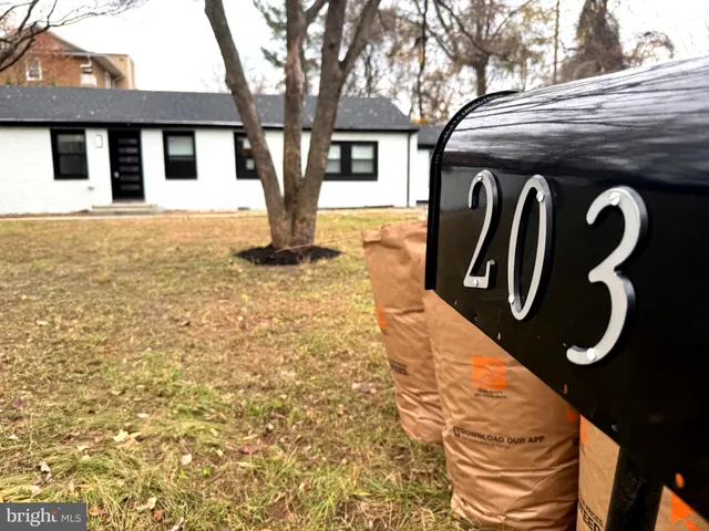 a front view of a house with parking