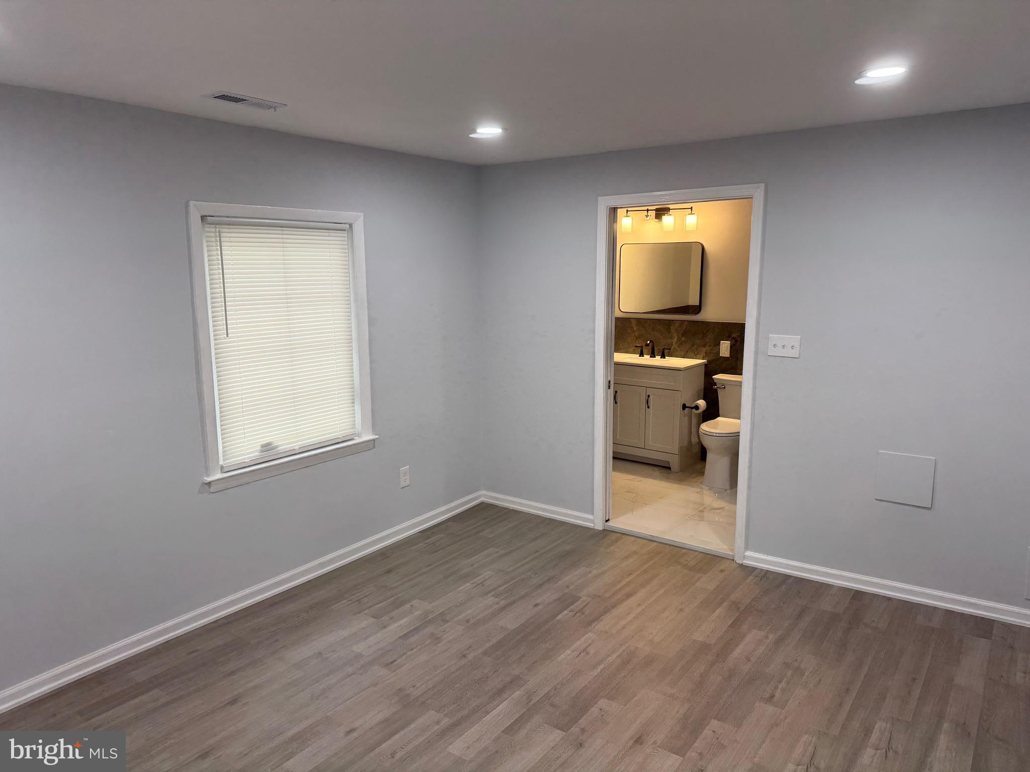 203 Henson Road Glen Burnie, MD 21060 - Photo 27 of 44 a view of a livingroom with a kitchen