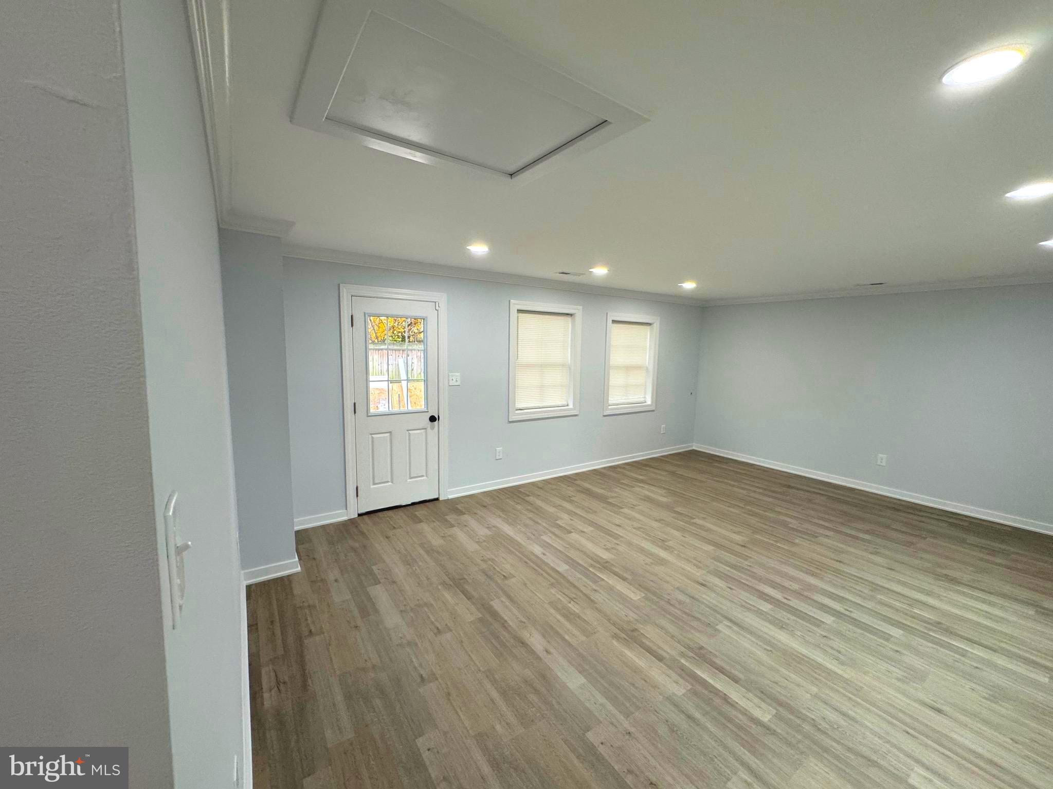 203 Henson Road Glen Burnie, MD 21060 - Photo 42 of 44 an empty room with windows