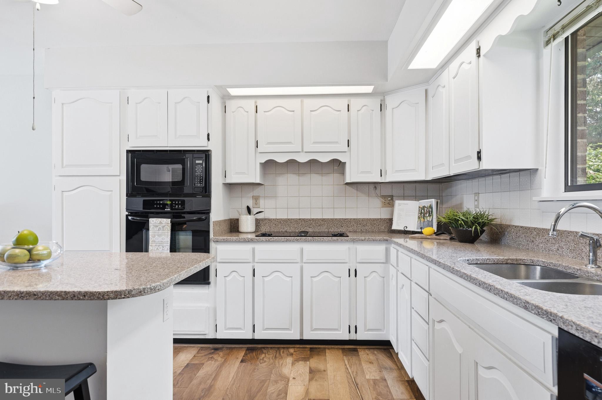 18040 Shipping Point Road Lexington Park, MD 20653 - Photo 21 of 75 Georgous quartz counters offer lots of prep space.