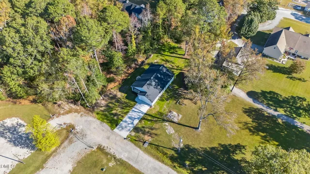 a view of swimming pool with a yard