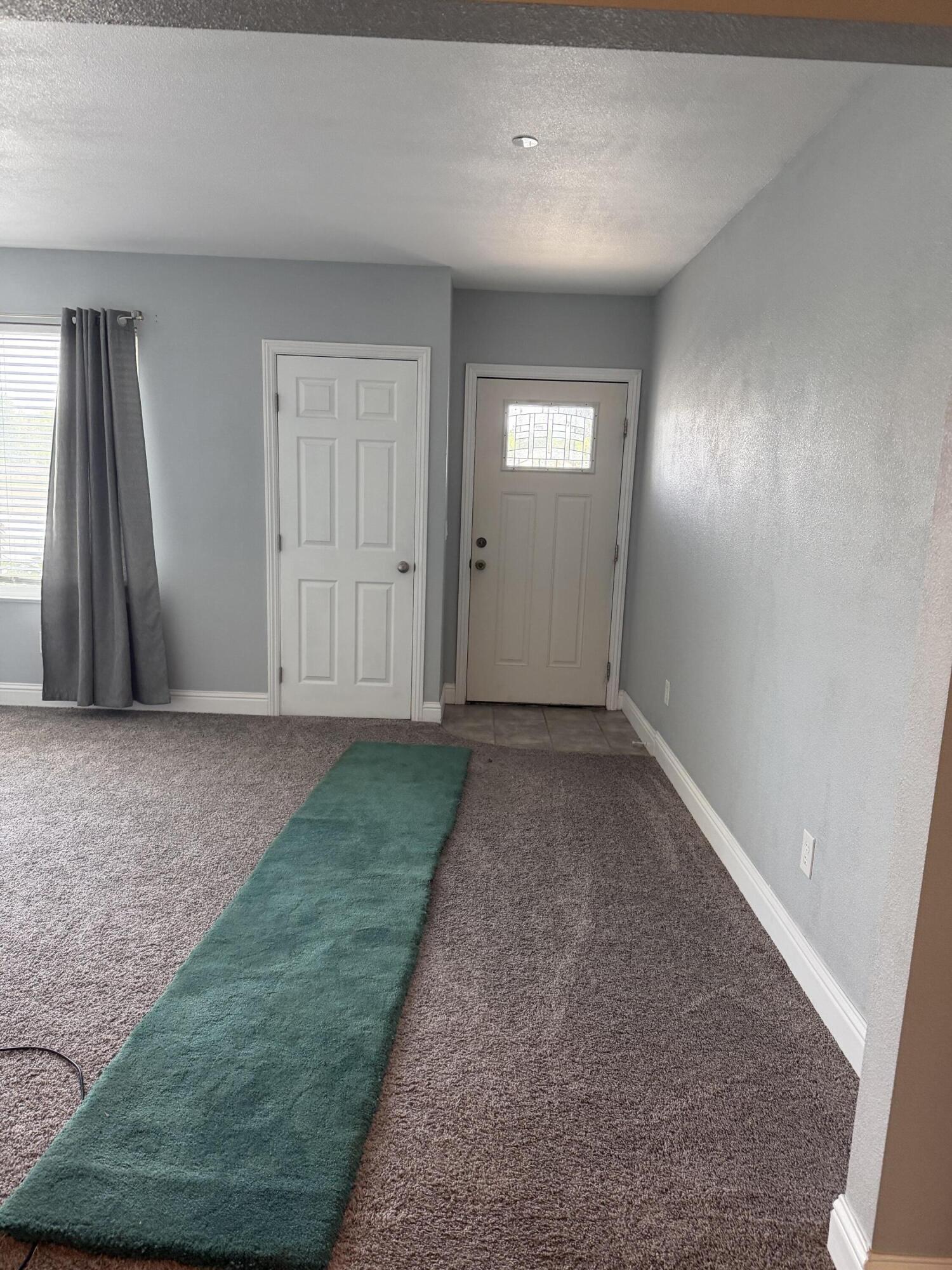 6200 Westside Road Redding, CA 96001 - Photo 13 of 50 an empty room with windows