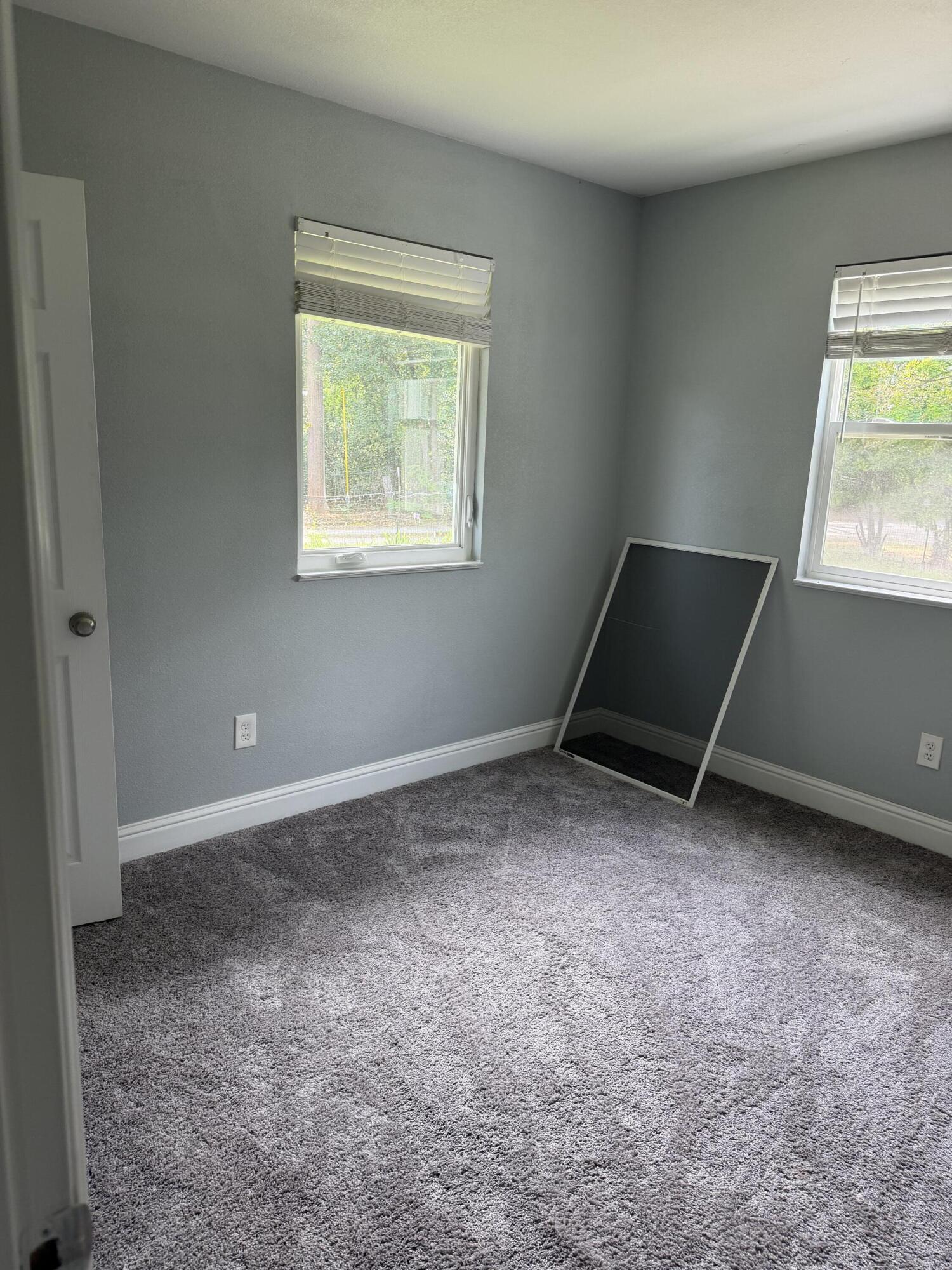 6200 Westside Road Redding, CA 96001 - Photo 18 of 50 an empty room with windows