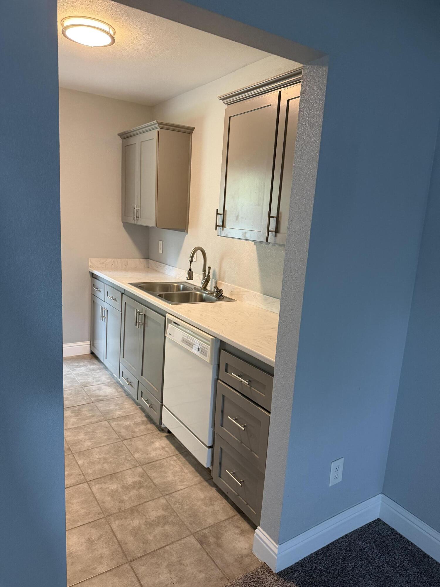 6200 Westside Road Redding, CA 96001 - Photo 25 of 50 a bathroom with a sink a mirror and a vanity