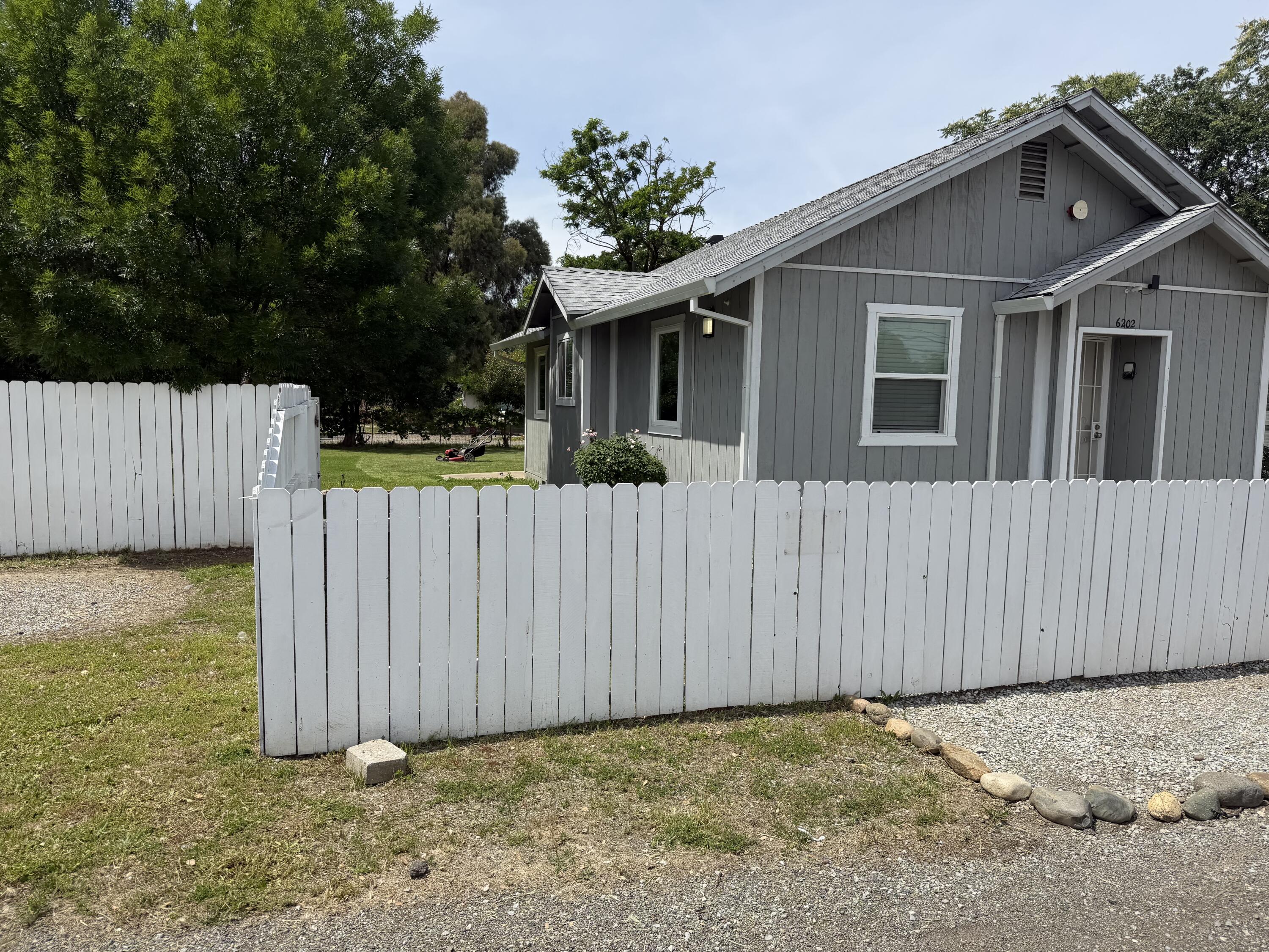 6200 Westside Road Redding, CA 96001 - Photo 3 of 50 a backyard of a house
