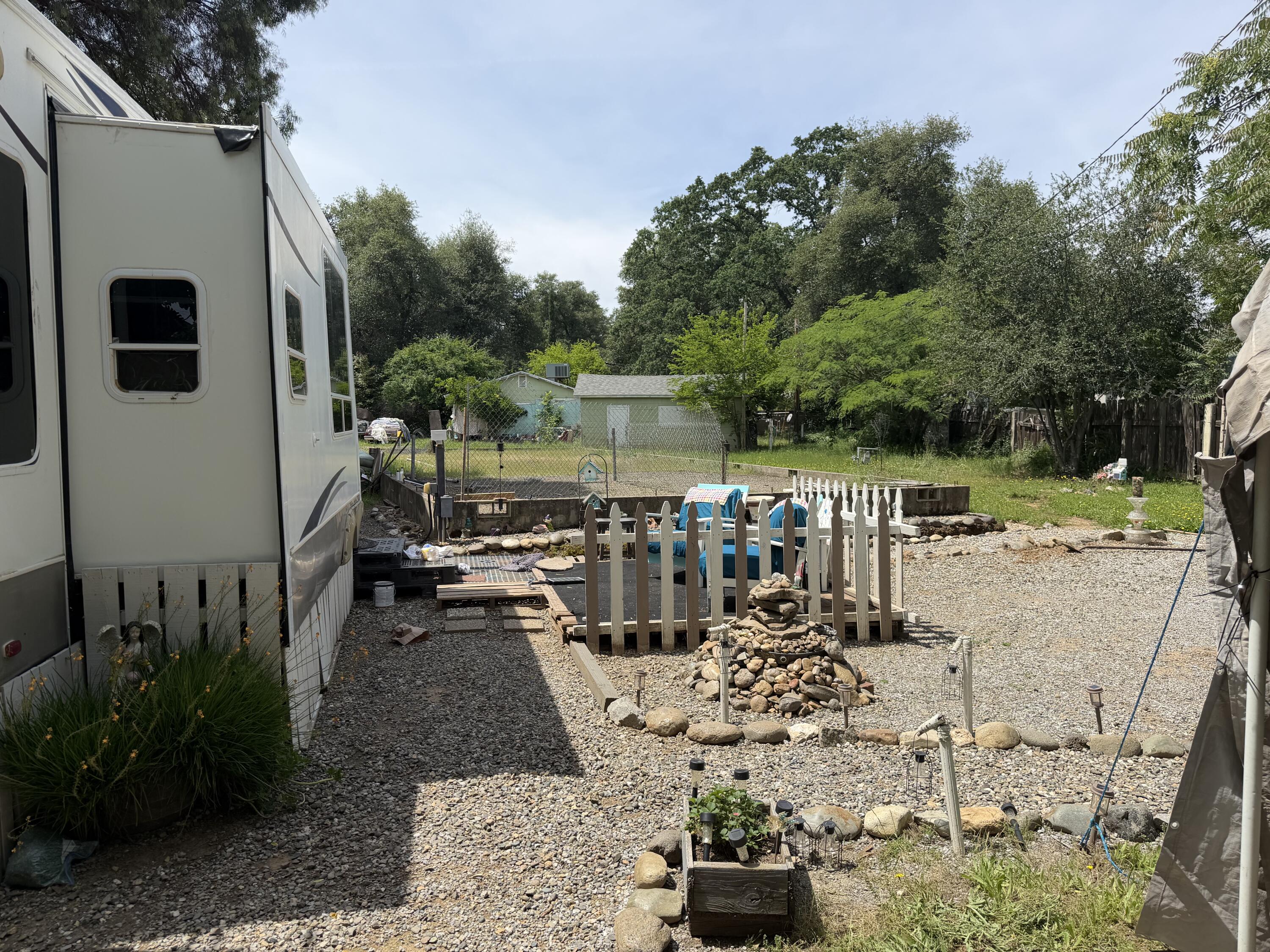 6200 Westside Road Redding, CA 96001 - Photo 44 of 50 a view of a backyard with sitting area