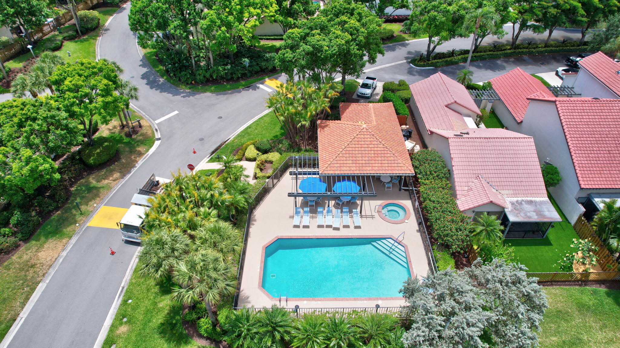 21700 Cromwell Circle Boca Raton, FL 33486 - Photo 65 of 72 LOUNGES AND UMBRELLAS
