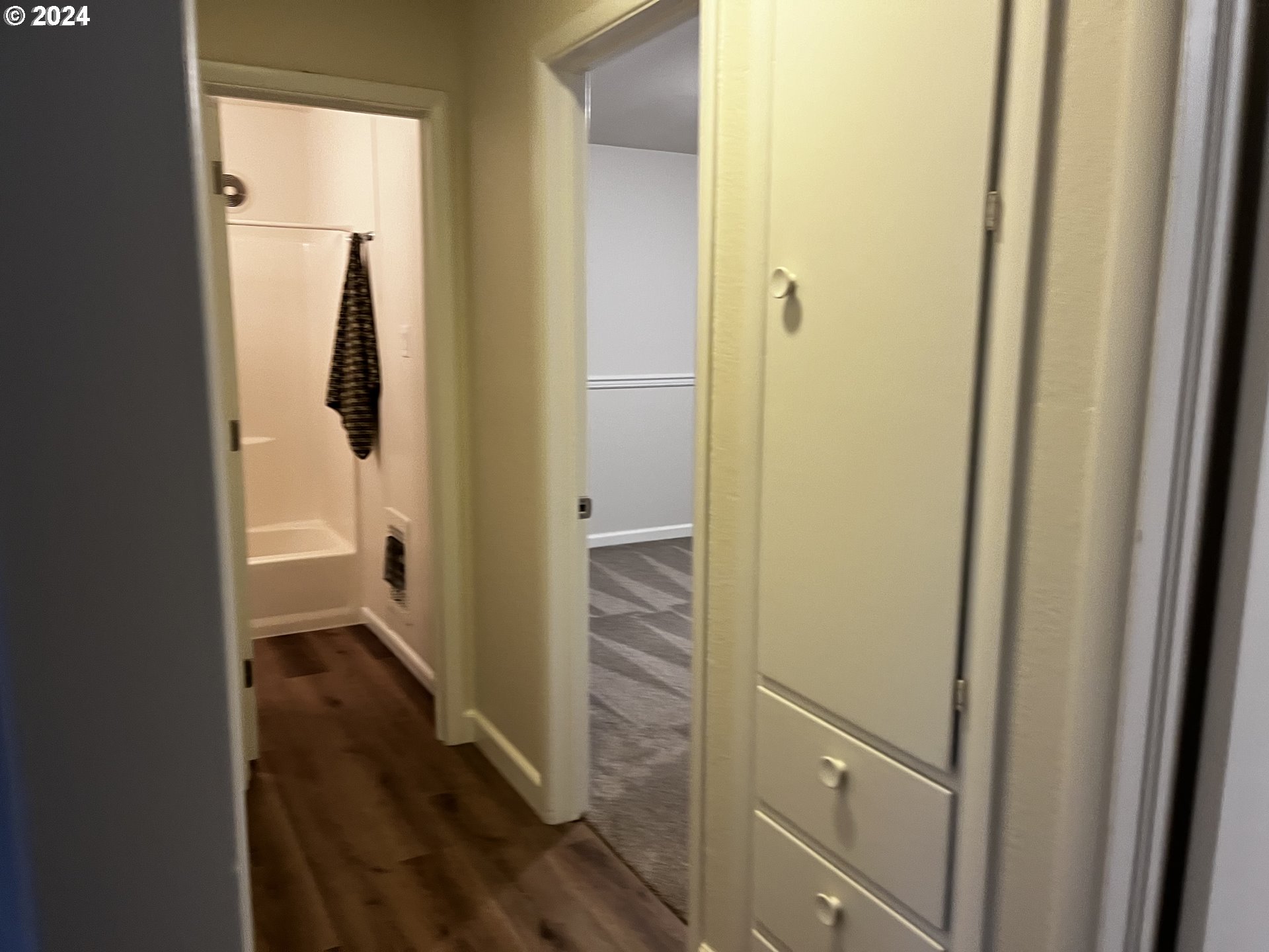 564 Nighthawk Lane Springfield, OR 97477 - Photo 3 of 13 a view of a bathroom from a corridor