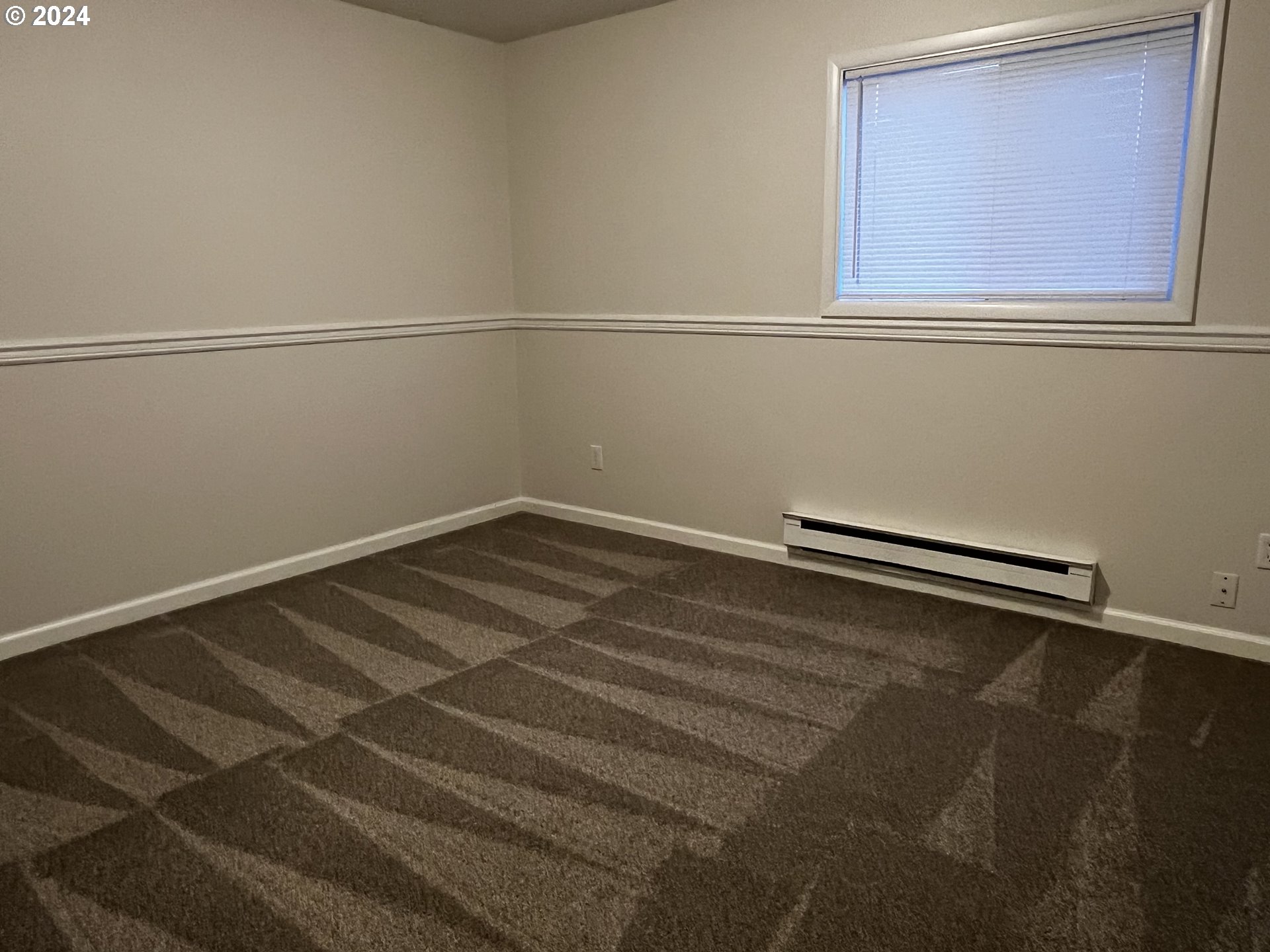 564 Nighthawk Lane Springfield, OR 97477 - Photo 5 of 13 a view of a room with rack on the wall