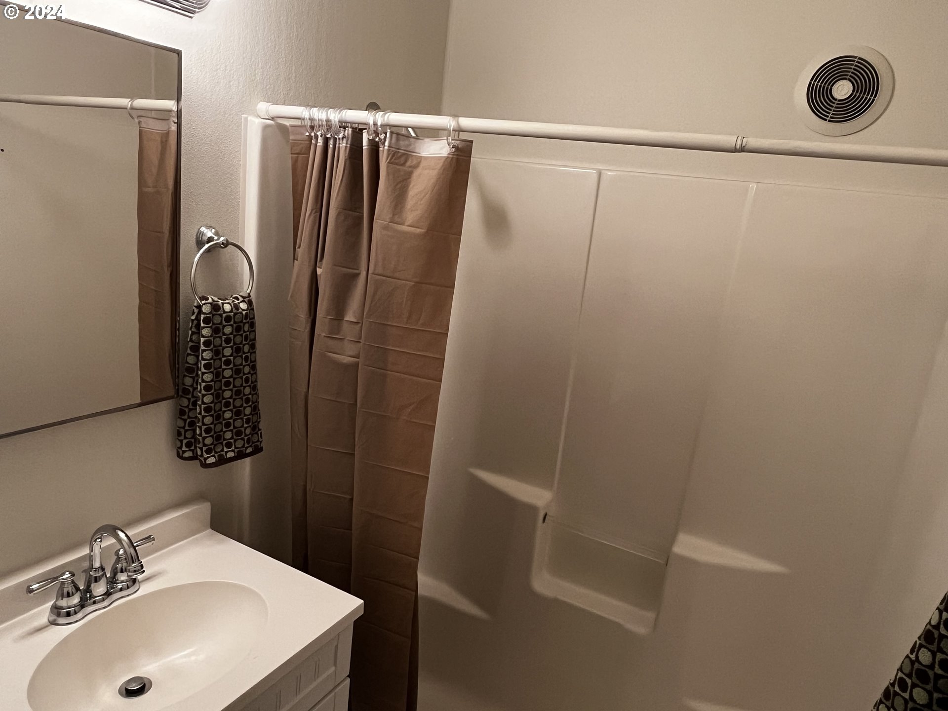 564 Nighthawk Lane Springfield, OR 97477 - Photo 6 of 13 a bathroom with a sink a toilet and shower