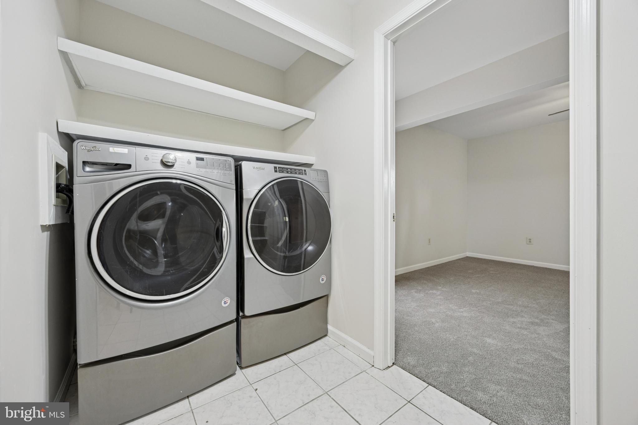 629 Rutland Road Morrisville, PA 19067 - Photo 18 of 25 Modern laundry space with sleek appliances.