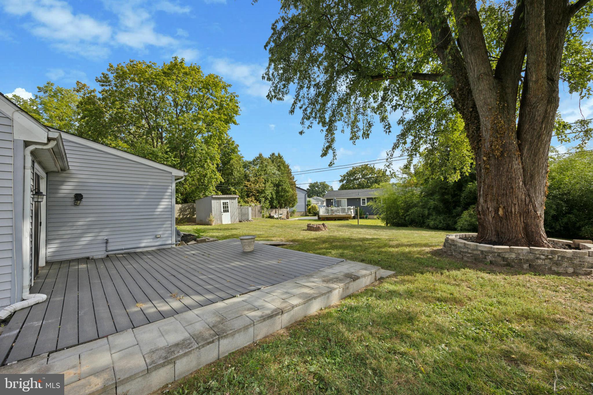 629 Rutland Road Morrisville, PA 19067 - Photo 23 of 25 Spacious backyard oasis with mature trees.