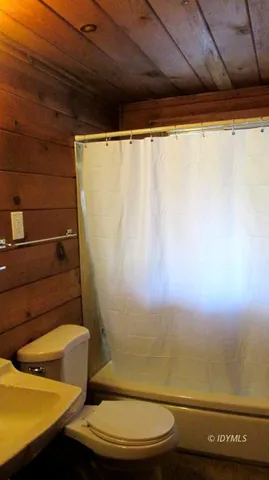 a bathroom with a toilet and a sink