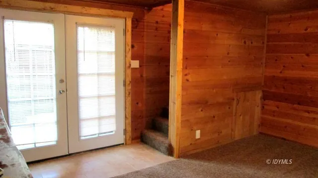 a view of an empty room and window