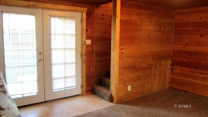 54100 Pine Crest Avenue, Unit 7 Idyllwild, CA 92549 - Photo 8 of 12 a view of an empty room and window