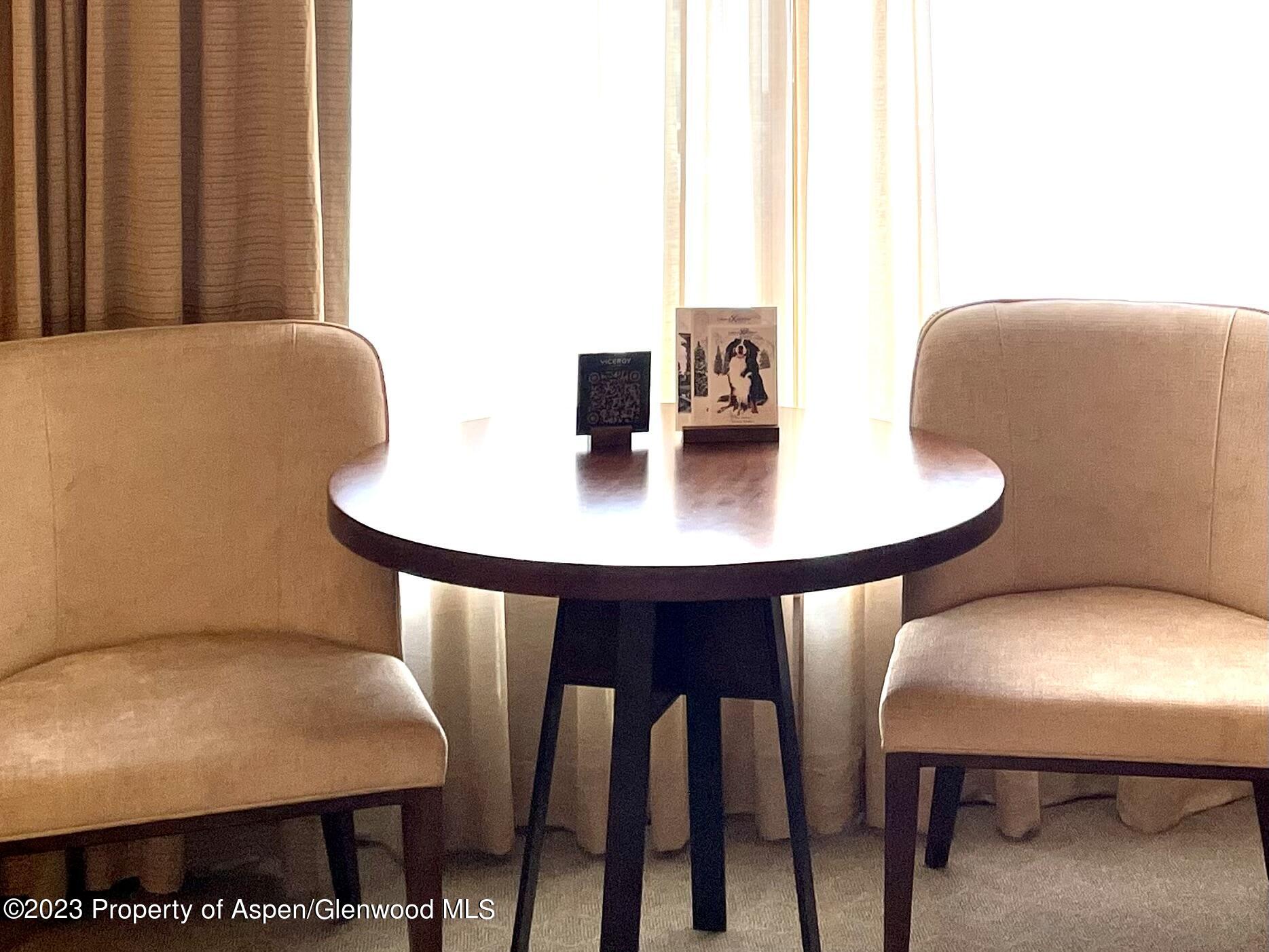 130 Wood Road, Unit 505 & 507 Snowmass Village, CO 81615 - Photo 11 of 35 a view of a dining room with furniture
