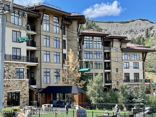 130 Wood Road, Unit 505 & 507 Snowmass Village, CO 81615 - Photo 17 of 35 a front view of a multi story building