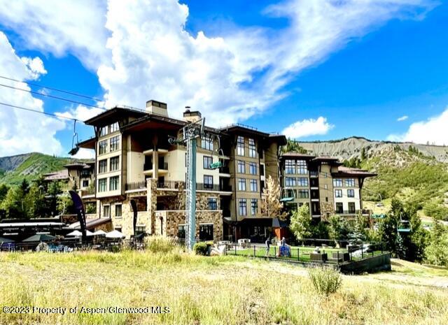 130 Wood Road, Unit 505 & 507 Snowmass Village, CO 81615 - Photo 18 of 35 a view of a house with swimming pool