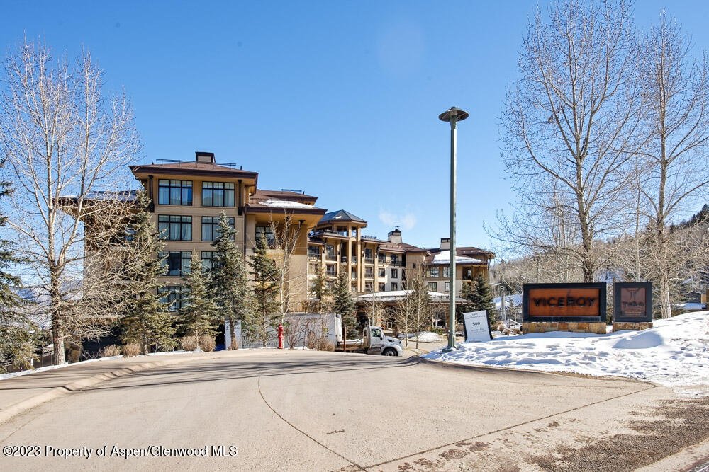 130 Wood Road, Unit 505 & 507 Snowmass Village, CO 81615 - Photo 33 of 35 a front view of a building with street view