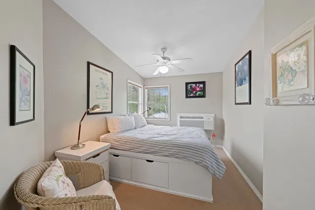 a living room with furniture and window