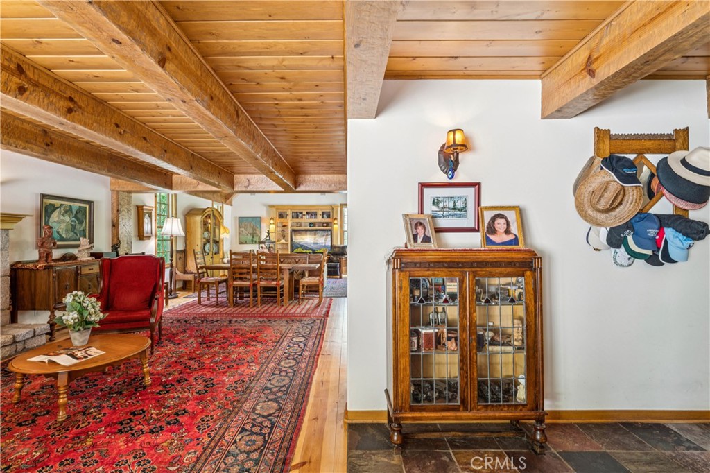 28971 North Shore Road Lake Arrowhead, CA 92352 - Photo 11 of 60 a dining room with furniture