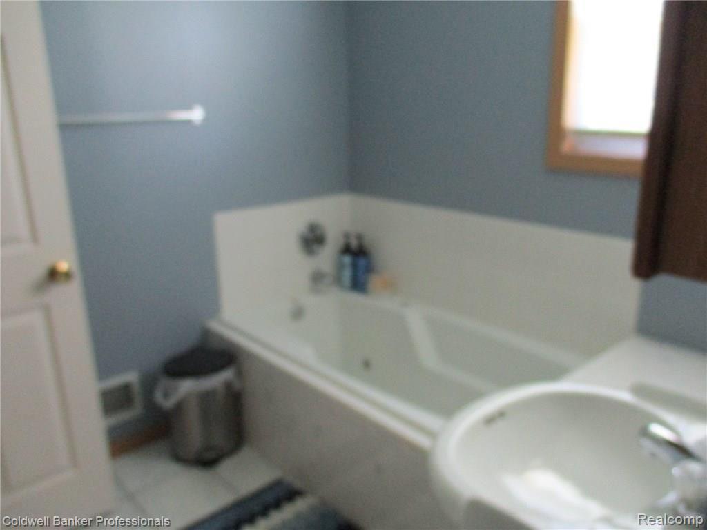4841 Newburg Road Durand, MI 48429 - Photo 38 of 55 33 LAUNDRY - FULLBATH.JPG