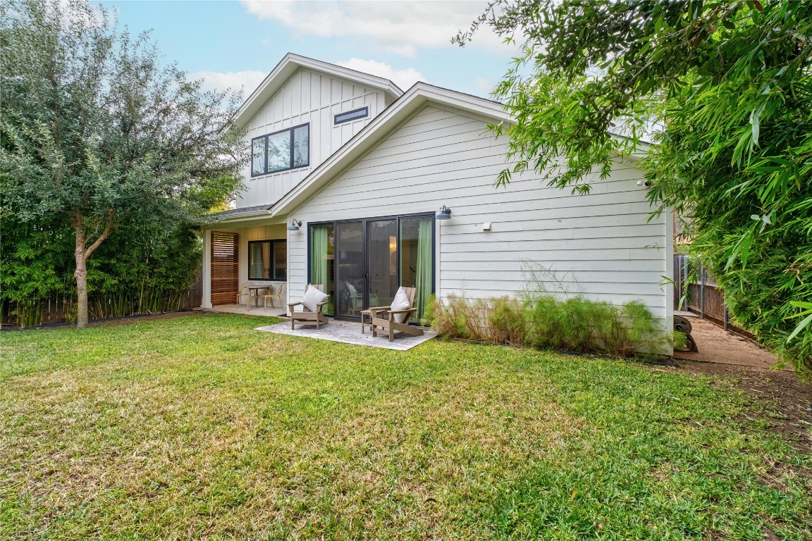 1806 Garden Street, Unit B Austin, TX 78702 - Photo 19 of 24 a view of a house with backyard and porch