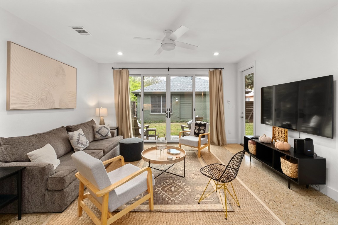 1806 Garden Street, Unit B Austin, TX 78702 - Photo 4 of 24 a living room with furniture and a flat screen tv