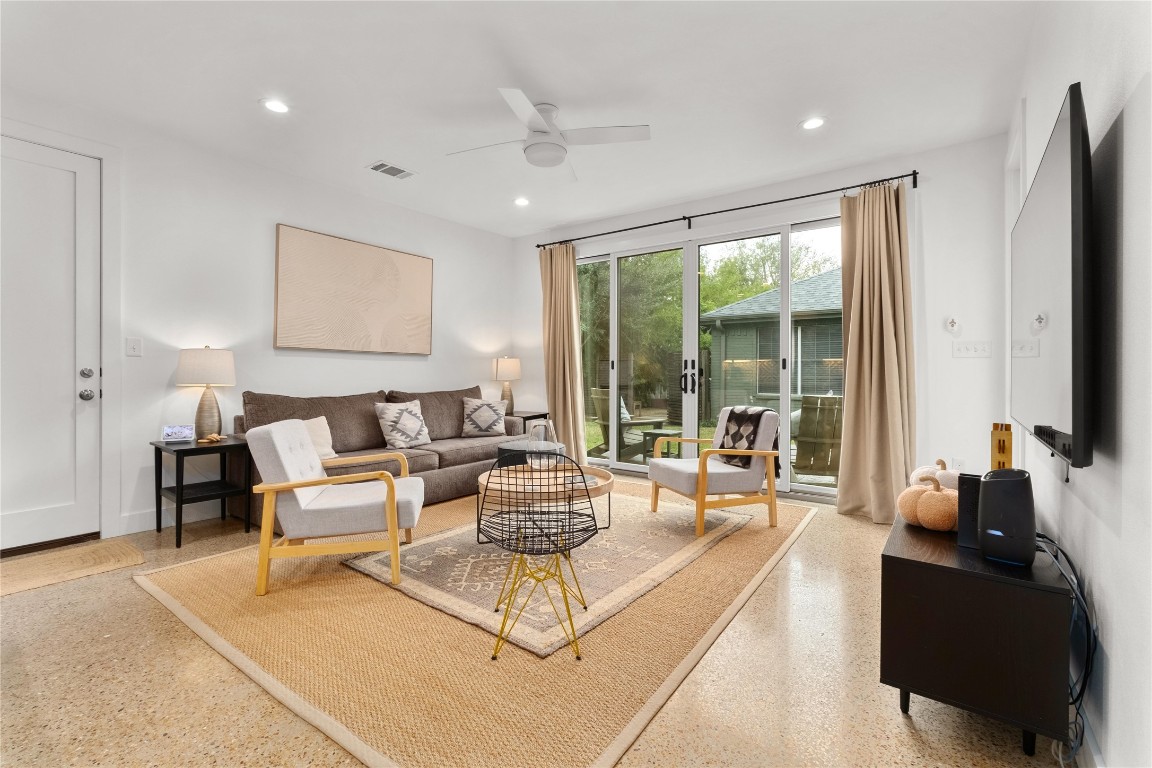 1806 Garden Street, Unit B Austin, TX 78702 - Photo 24 of 24 a living room with furniture and large windows