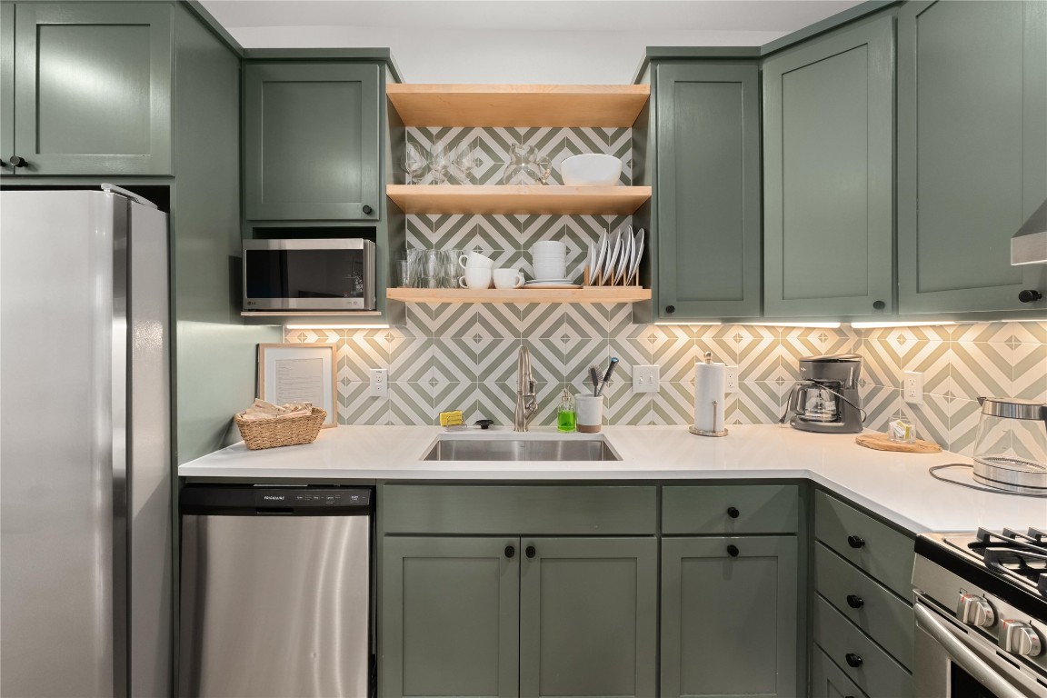 1806 Garden Street, Unit B Austin, TX 78702 - Photo 9 of 24 a view of a kitchen with an oven