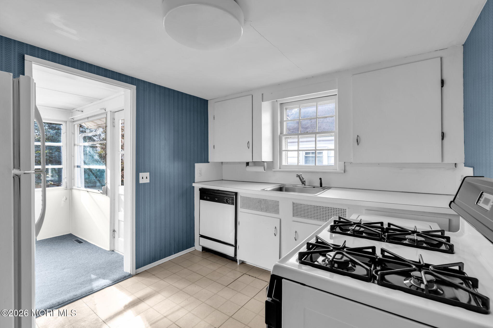2609 River Road Manasquan, NJ 08736 - Photo 14 of 28 a kitchen with a stove and a sink